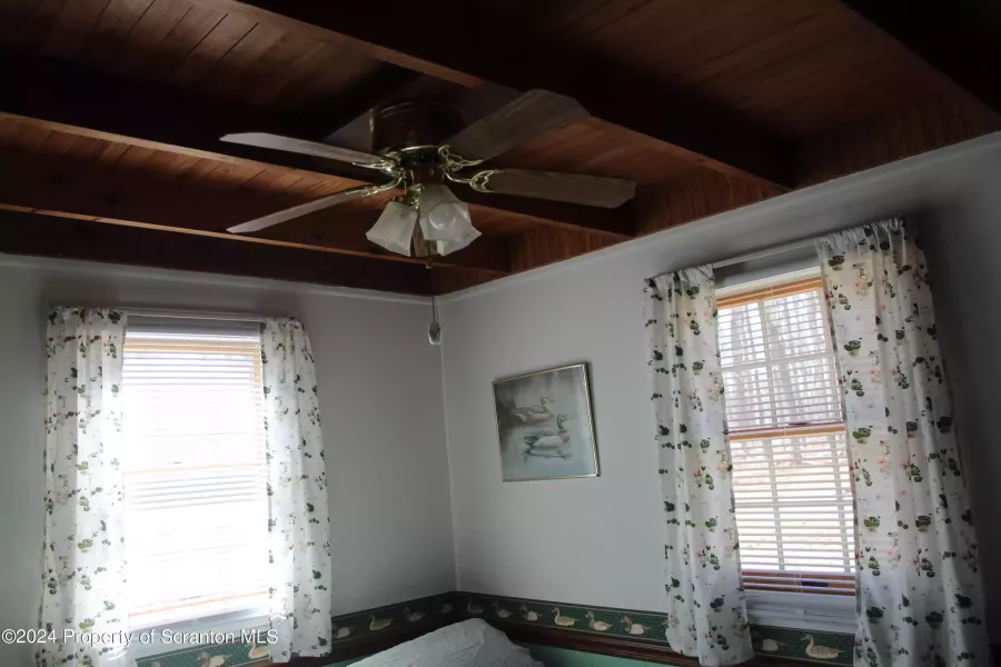 wood ceiling in bedroom