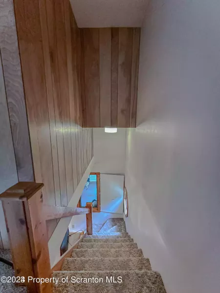 Stairs by kitchen